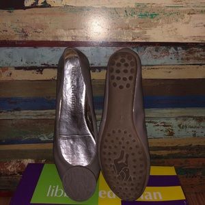 Patent leather tan worn flat.